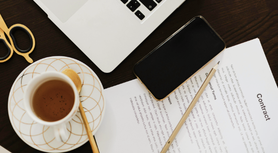 Founder reviewing freelancer contract after giving too many bonuses that created entitlement