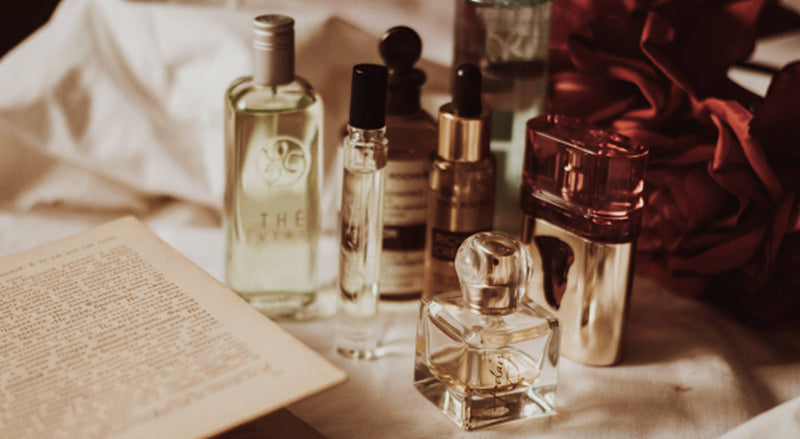 Glass fragrance bottles and product display representing pop-up store decisions for small brands